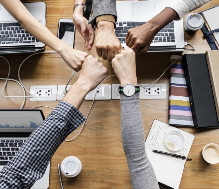 Colleagues giving a fist bump